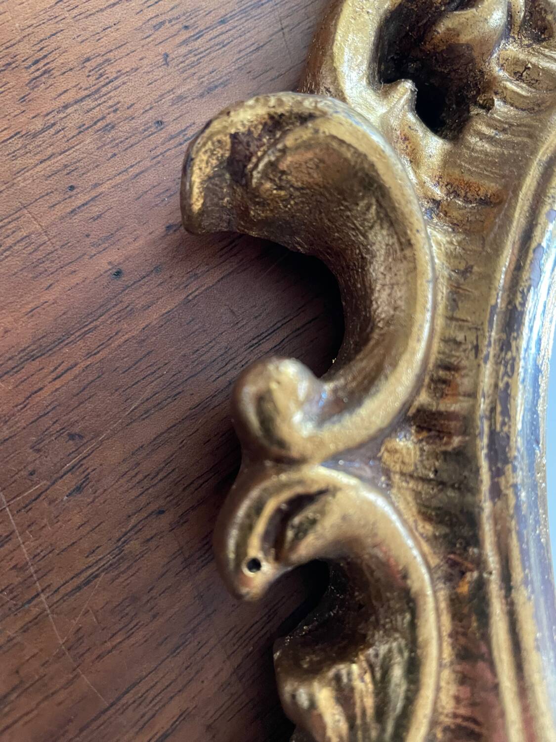 Golden rockery mirror