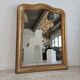 Louis Philippe gilded mirror with gendarme hat nineteenth H:130cm