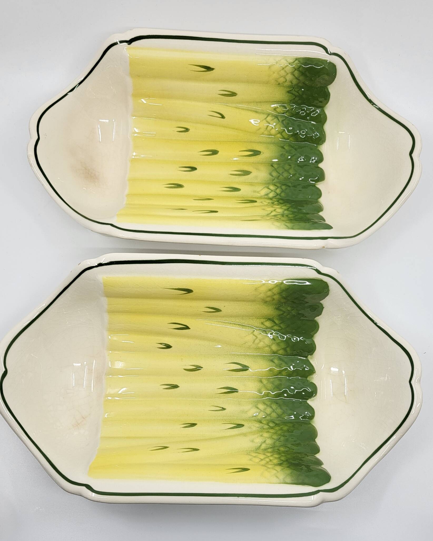Salins earthenware slip dish decorated with asparagus, French, yellow and green, 20th century