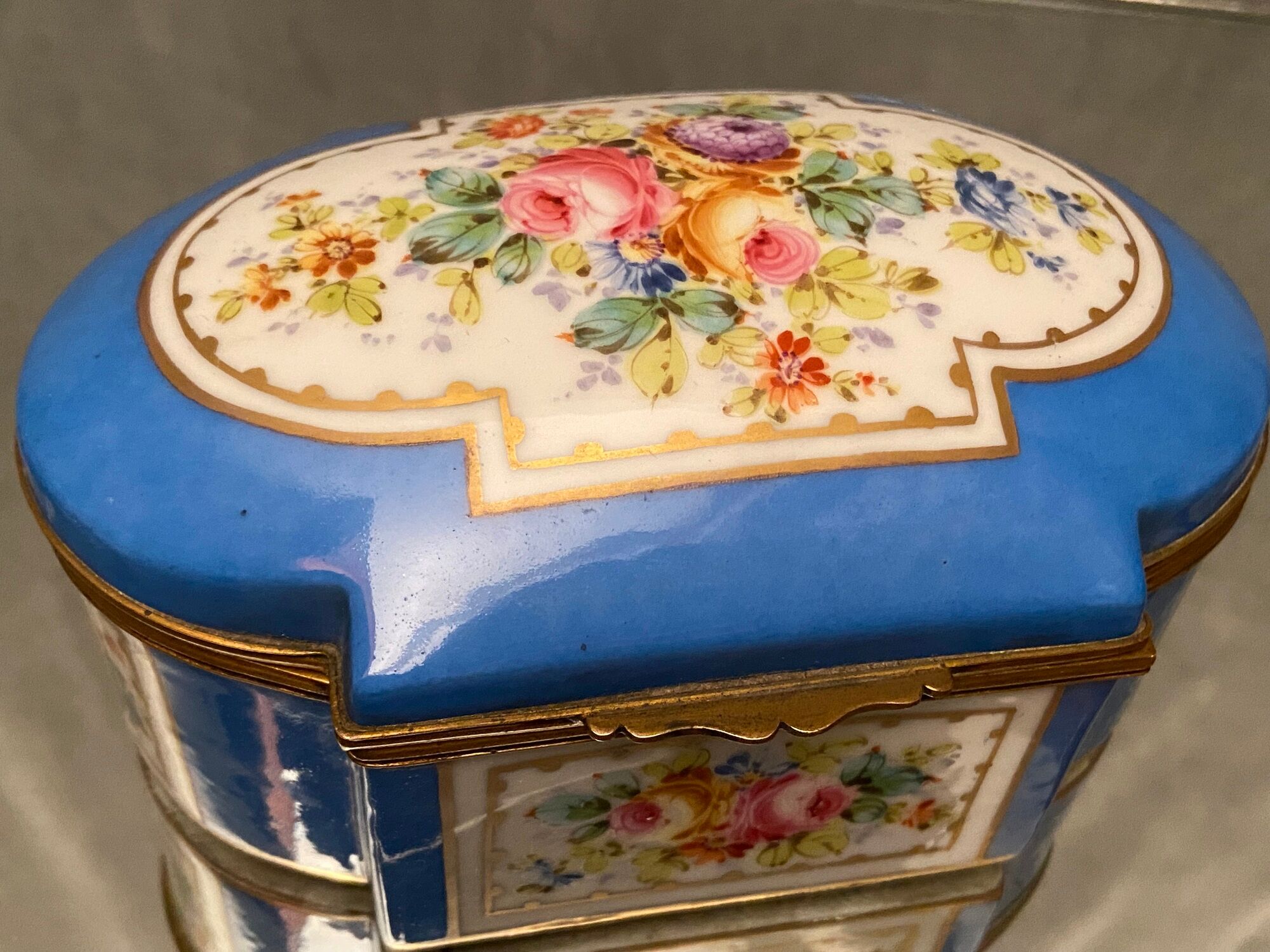 Domed porcelain box polychrome floral decoration on blue background brand Sèvres