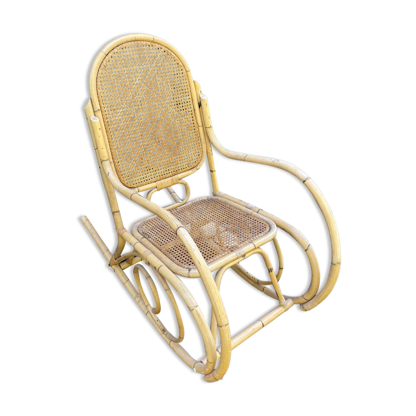 Rocking chair en cannage et rotin