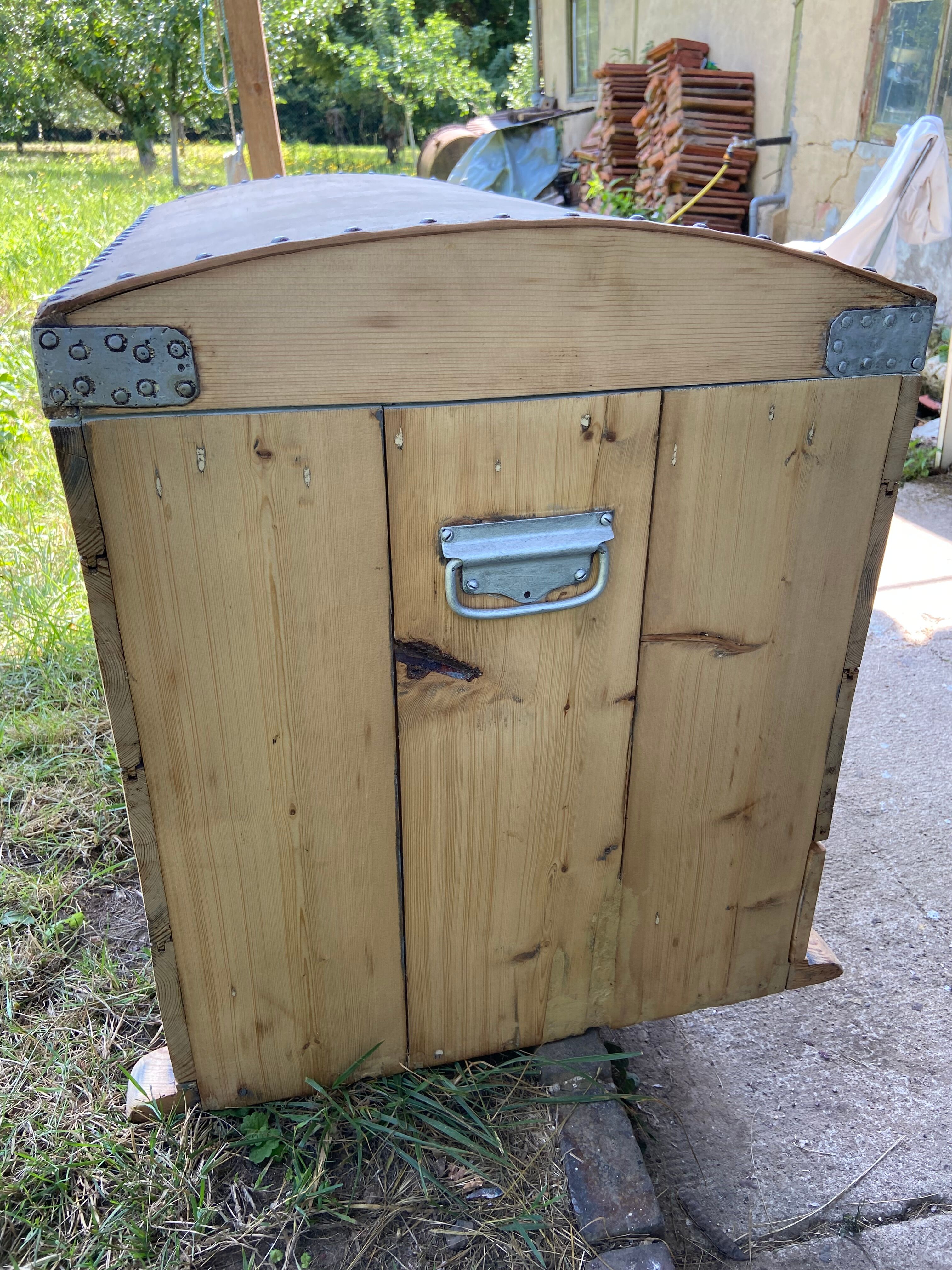 Raw wooden chest with a secret drawer