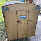 Raw wooden chest with a secret drawer