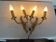 Pair of double wall lights in gilded bronze