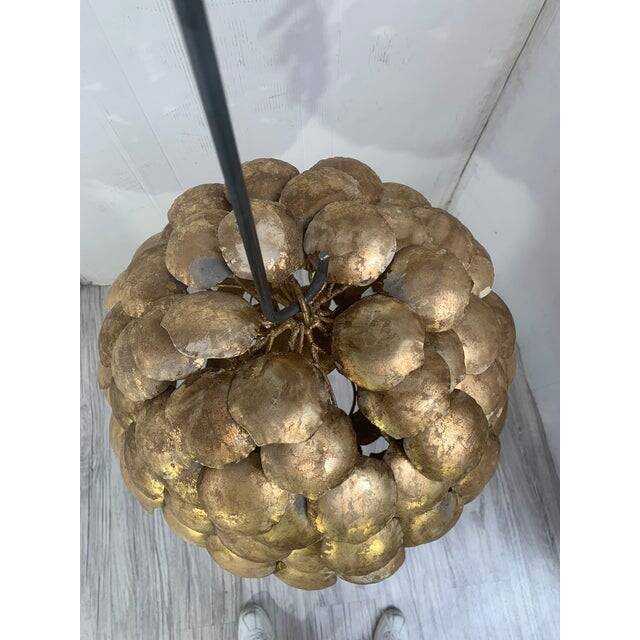 Contemporary gold florentine iron pendant light