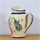 Pitcher in earthenware signed Henriot