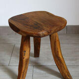 Brutalist stool made of olive wood