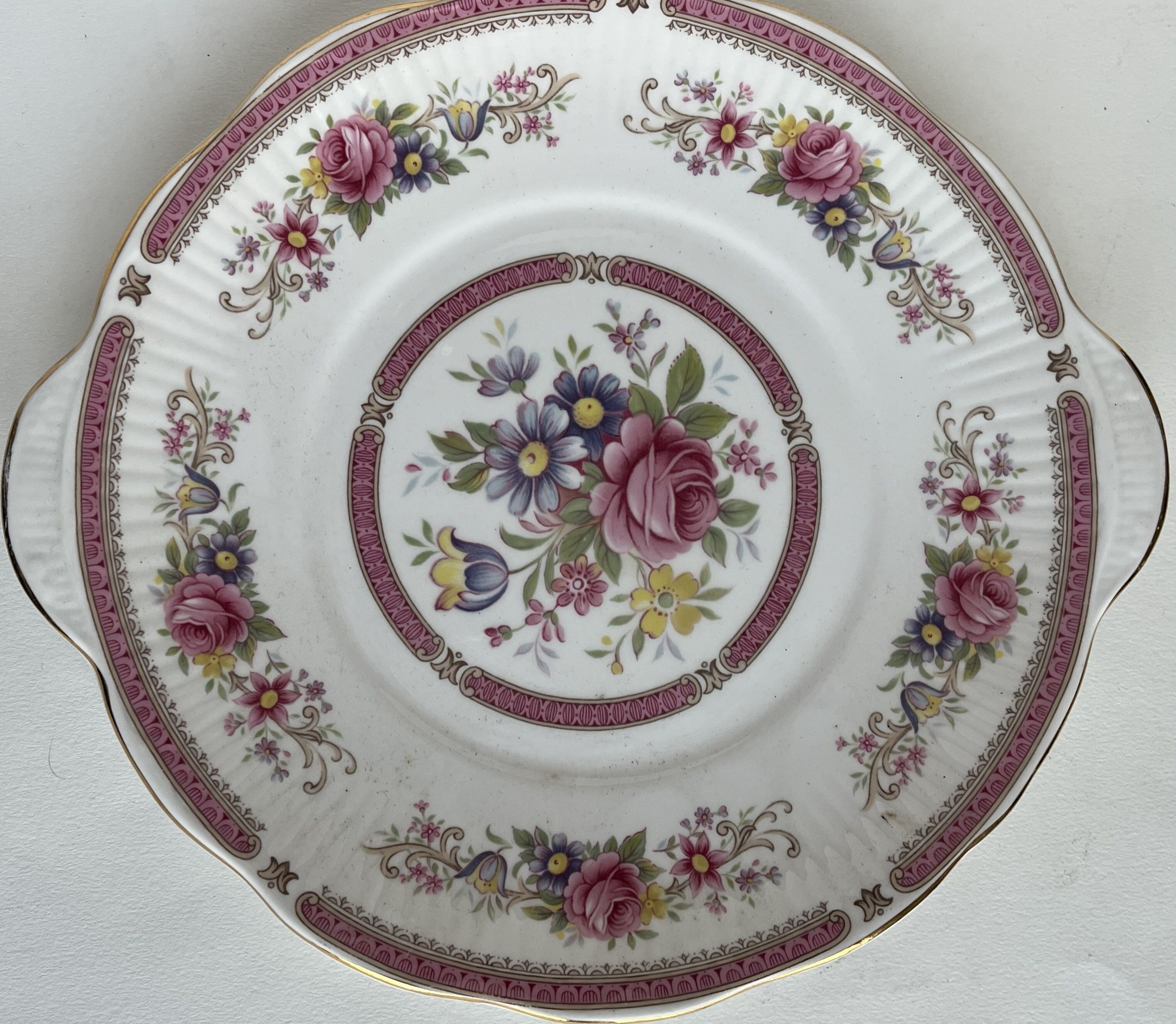 10 porcelain plates and a dish