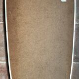 Vintage 1960s mirror in a freeform shape with a gold and red trim.