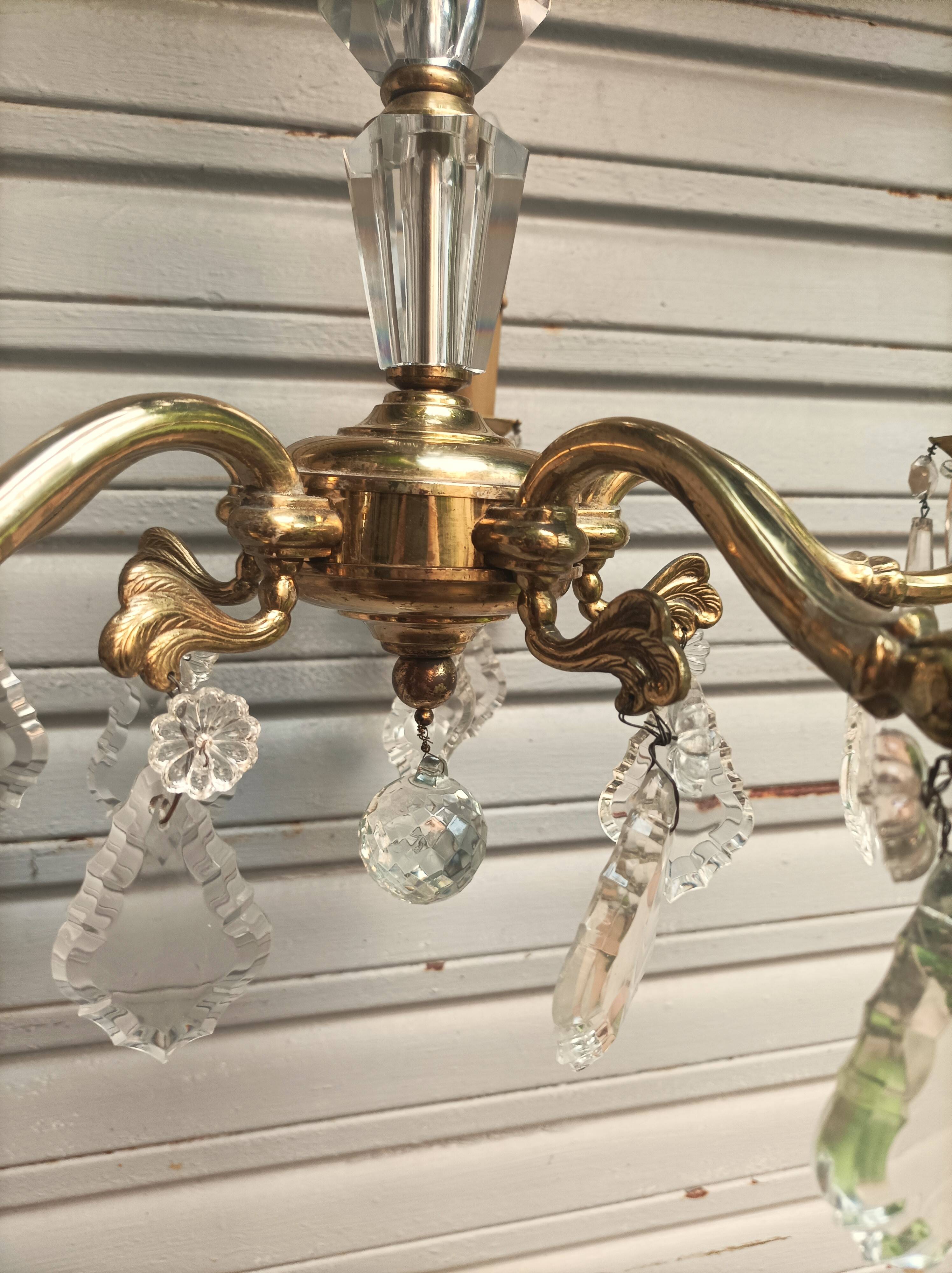 Exceptional bronze chandelier with crystal pendants in working order circa 1910