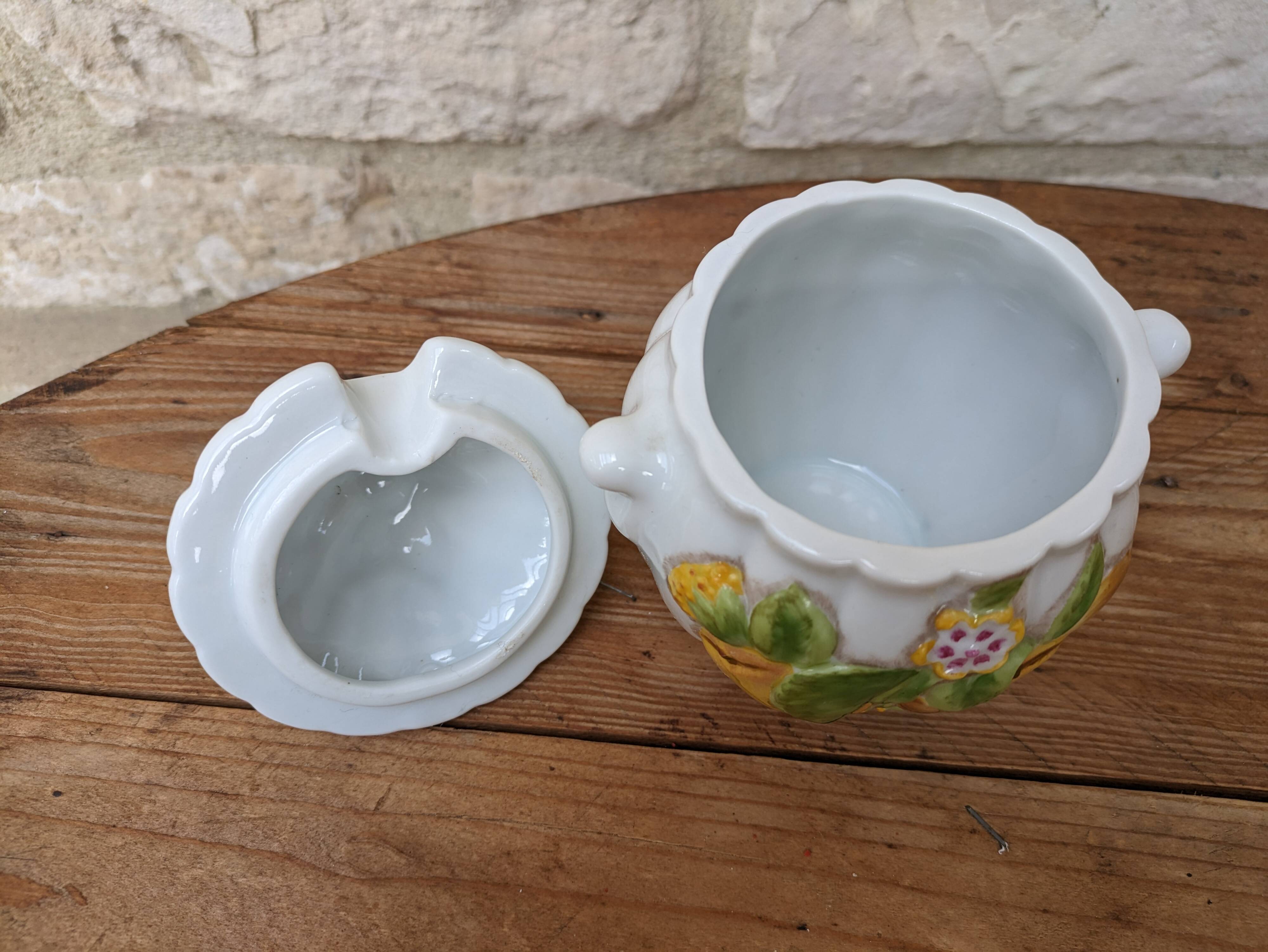 Old ceramic sugar bowl with yellow fruit motif