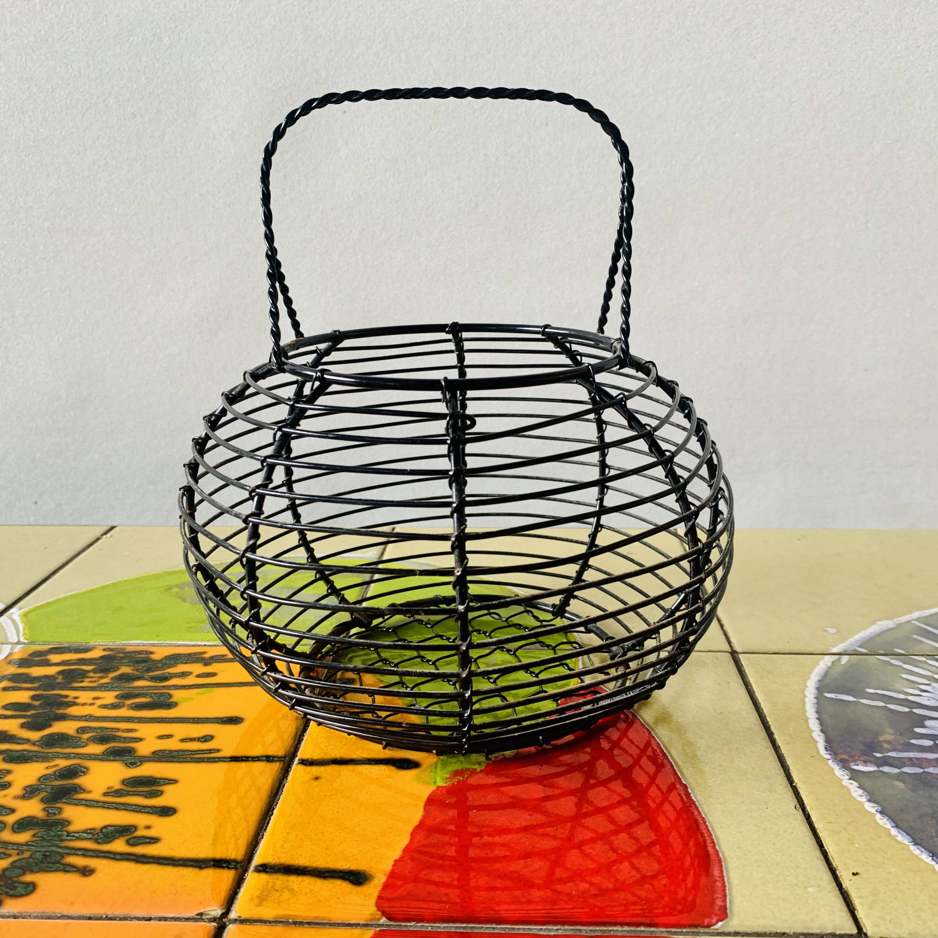 Vintage black metal egg basket