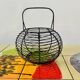 Vintage black metal egg basket