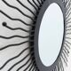 Black metal sunburst wall mirror, round 63x63 cm, vintage 1990s, made in Italy