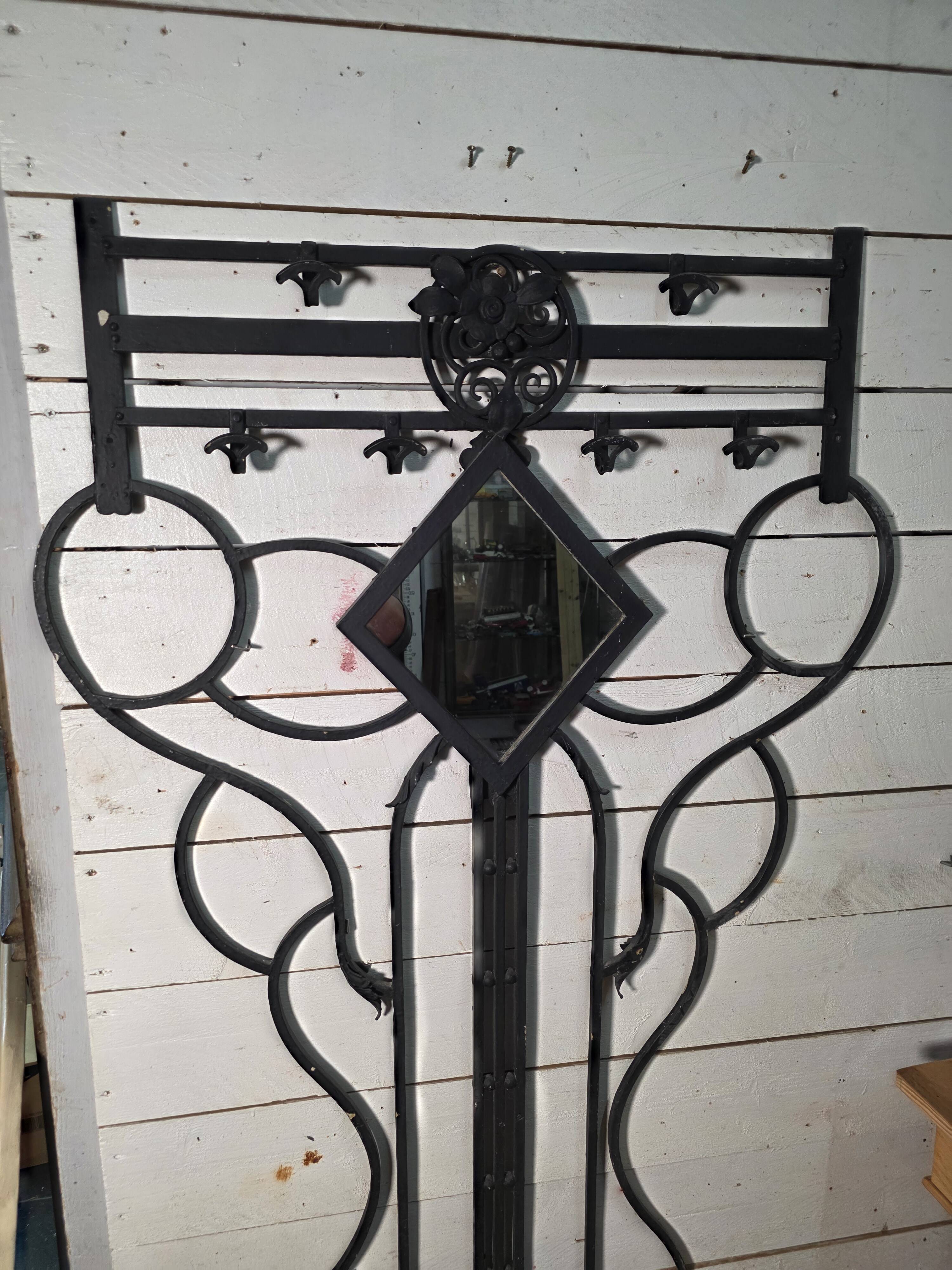 Art Deco coat rack wardrobe in wrought iron from the 1930s.