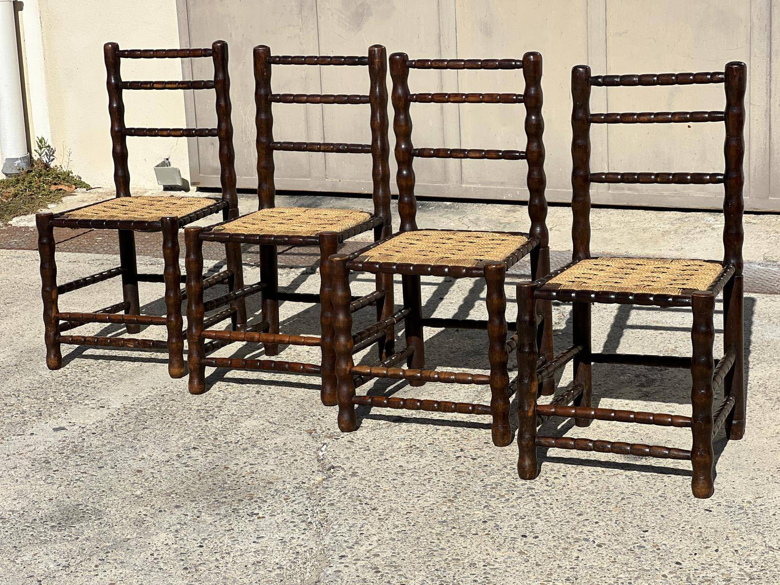4 wooden and rope bobbin leg chairs attributed to Charles Dudouyt 1940