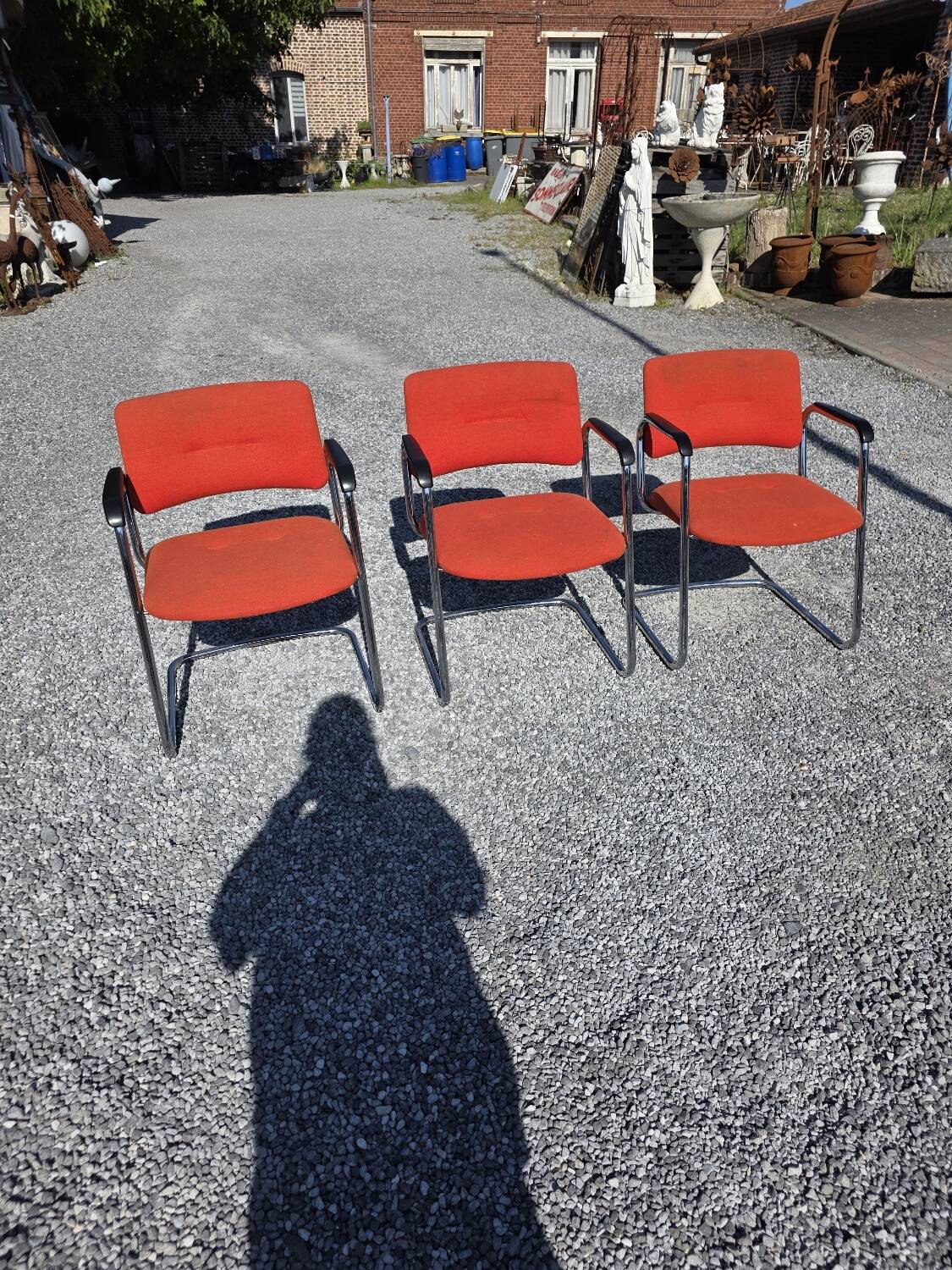 3 vintage chrome metal armchairs with orange fabric tops