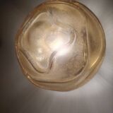 Textured amber globe wall light