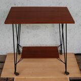 Tv furniture, a table with teak wheels and Scandinavian-style metal.