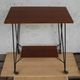 Tv furniture, a table with teak wheels and Scandinavian-style metal.