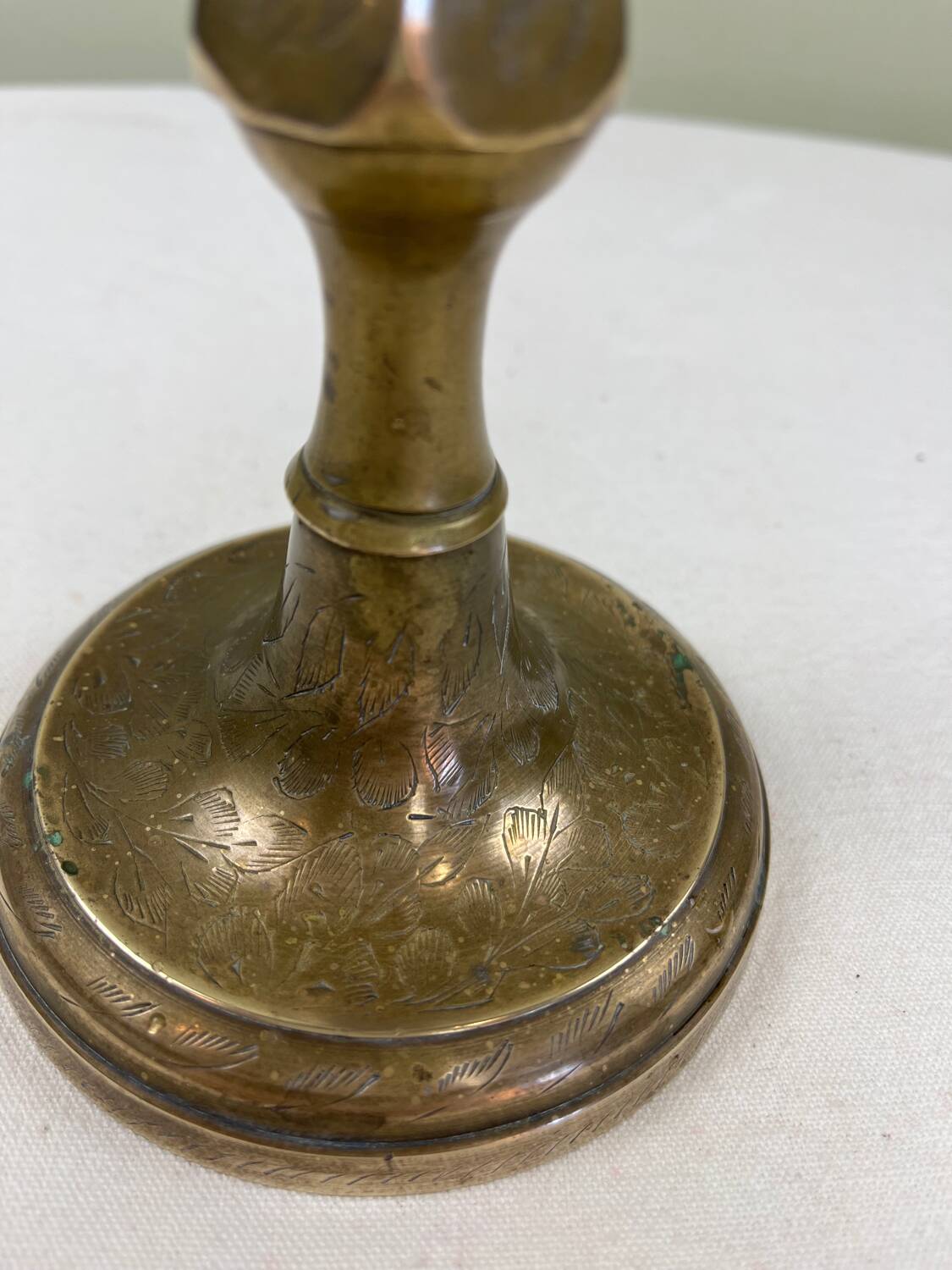 Engraved brass candle holder