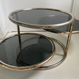 Milo Baughman vintage round coffee table with chrome swivel tops and smoked glass