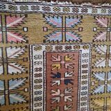 Handmade rectangular oriental rug dating from the 1960s in 100% wool
