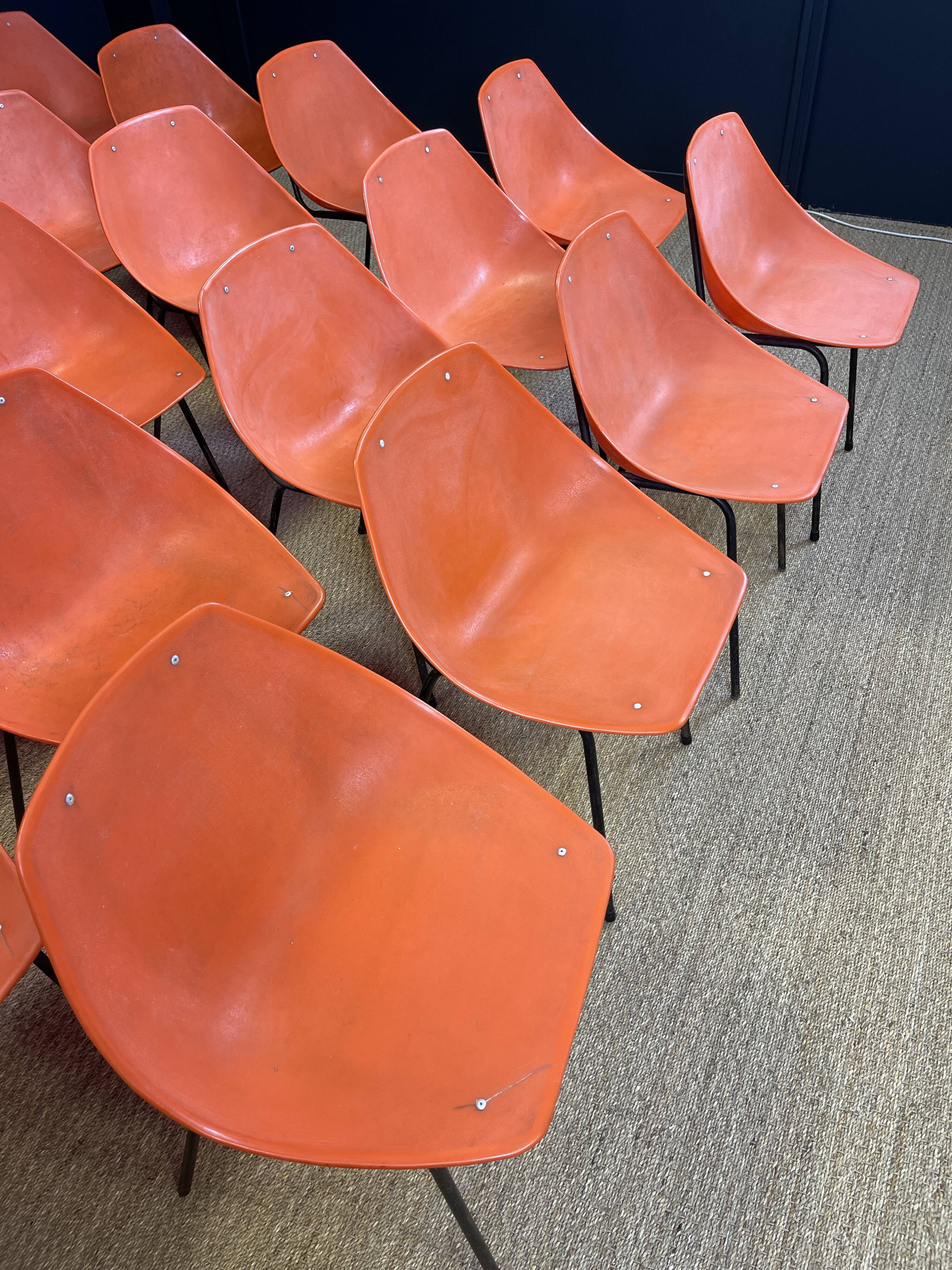 Set of 24 orange Guariche chairs