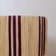 Table lamp in natural raffia with purple stripes