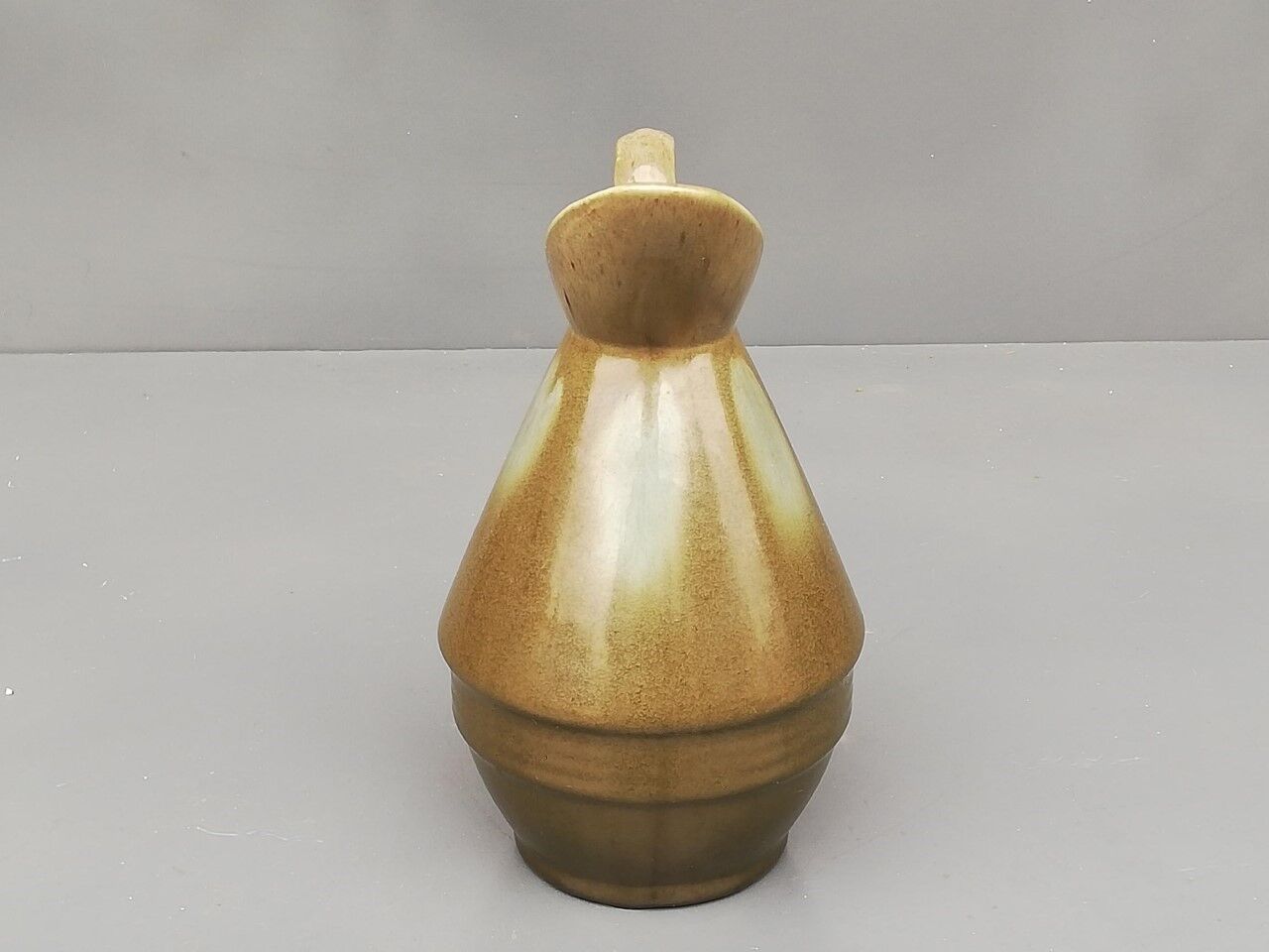 Pitcher in green enamelled ceramic Signed by the Lille manufacture Fives-Lille De Bruyn.