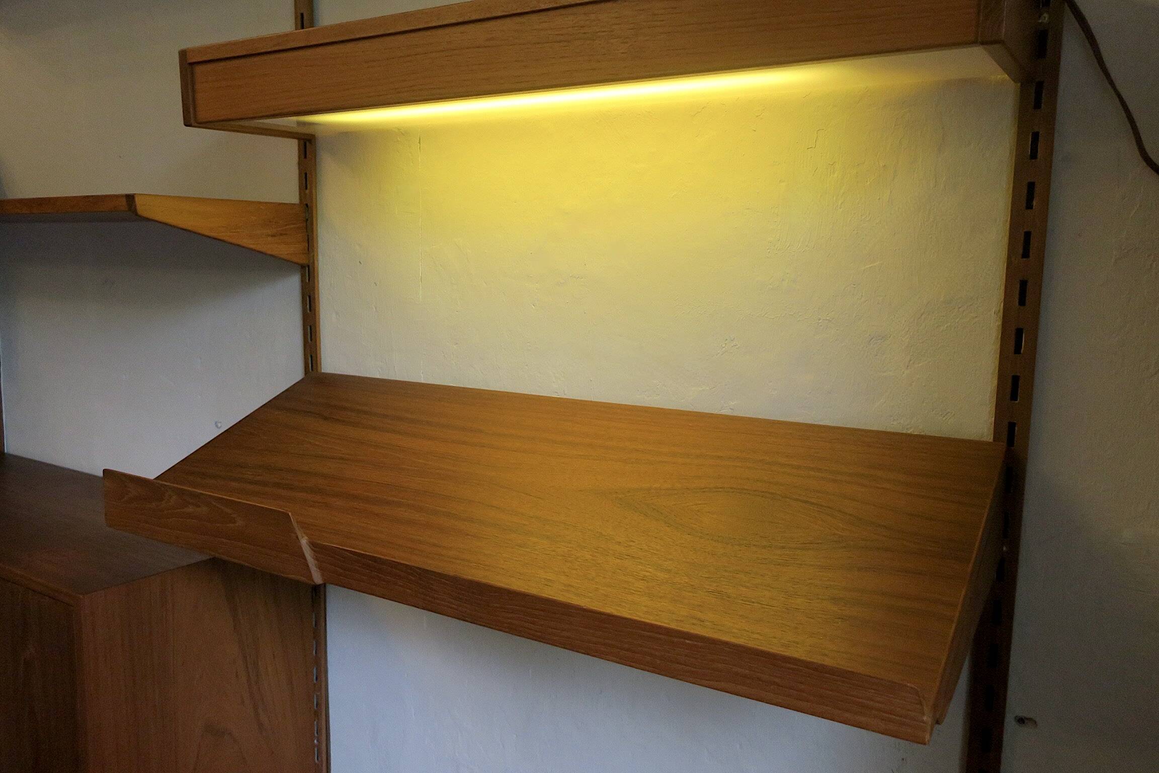 Modular 3-compartment teak wall shelving system with desk and lighting by Kai Kristiansen for FM, Denmark, 1960s
