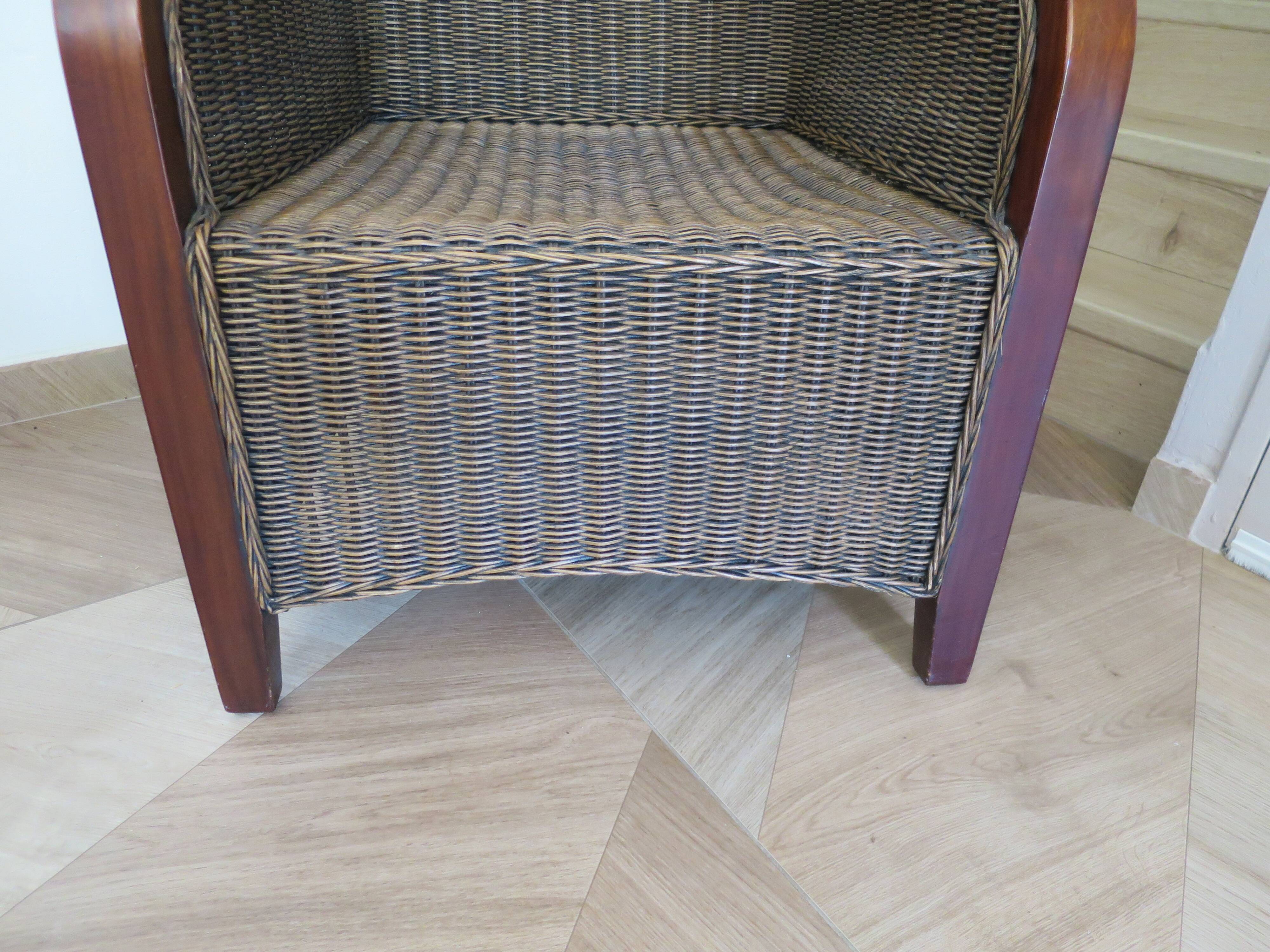 2 armchairs in woven rattan and wood, 1980s