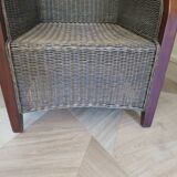 2 armchairs in woven rattan and wood, 1980s