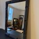 Patinated black rectangular wooden mirror