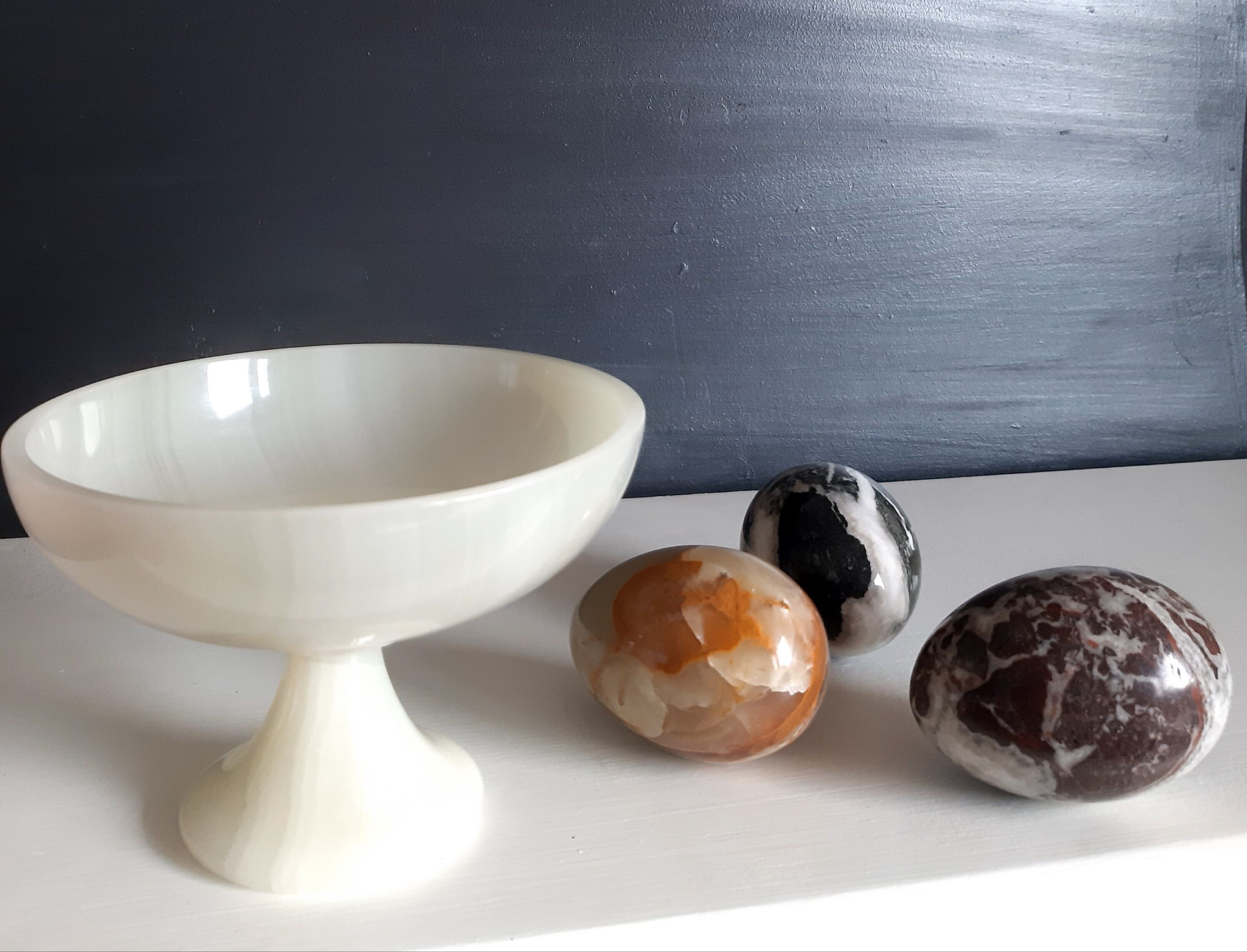 Alabaster cup and 3 eggs