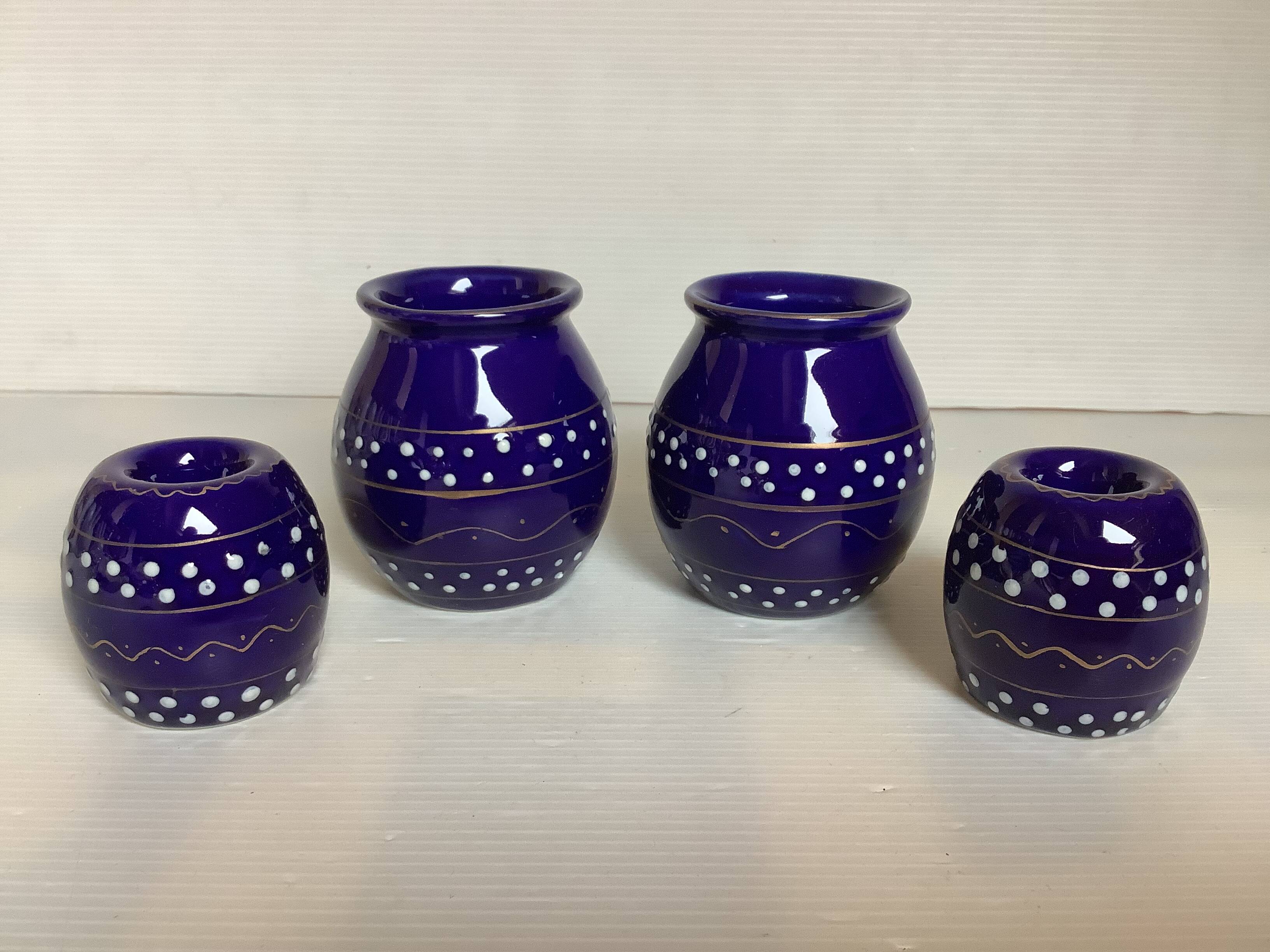 Pair of small enamelled cobalt blue candlesticks and vases