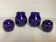 Pair of cobalt blue enamelled candlesticks and vases