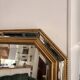 Octagonal mirror with bevelled parcloses, Neo-Classical Regency Art style.