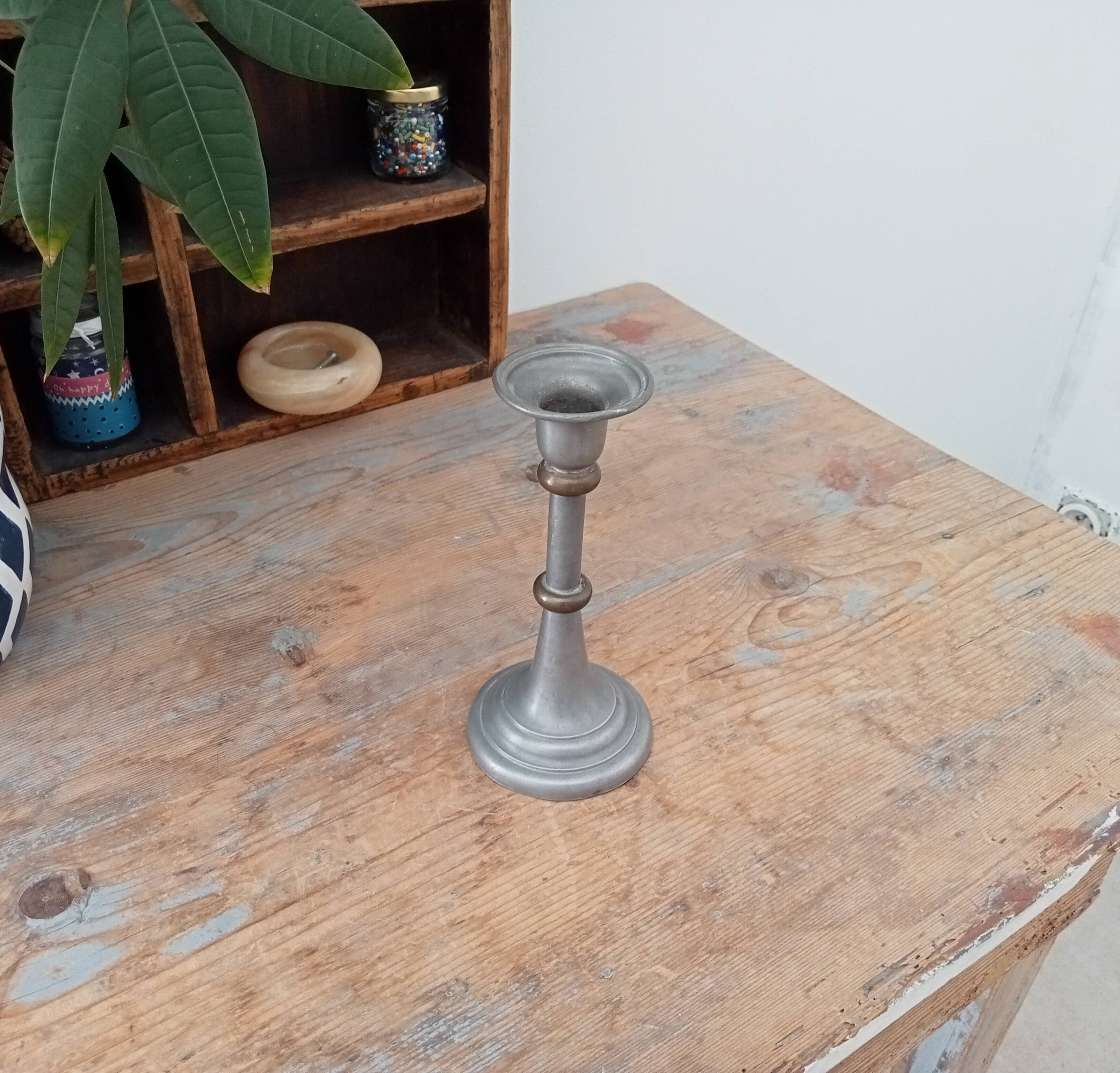 Antique candle holder in pewter and brass