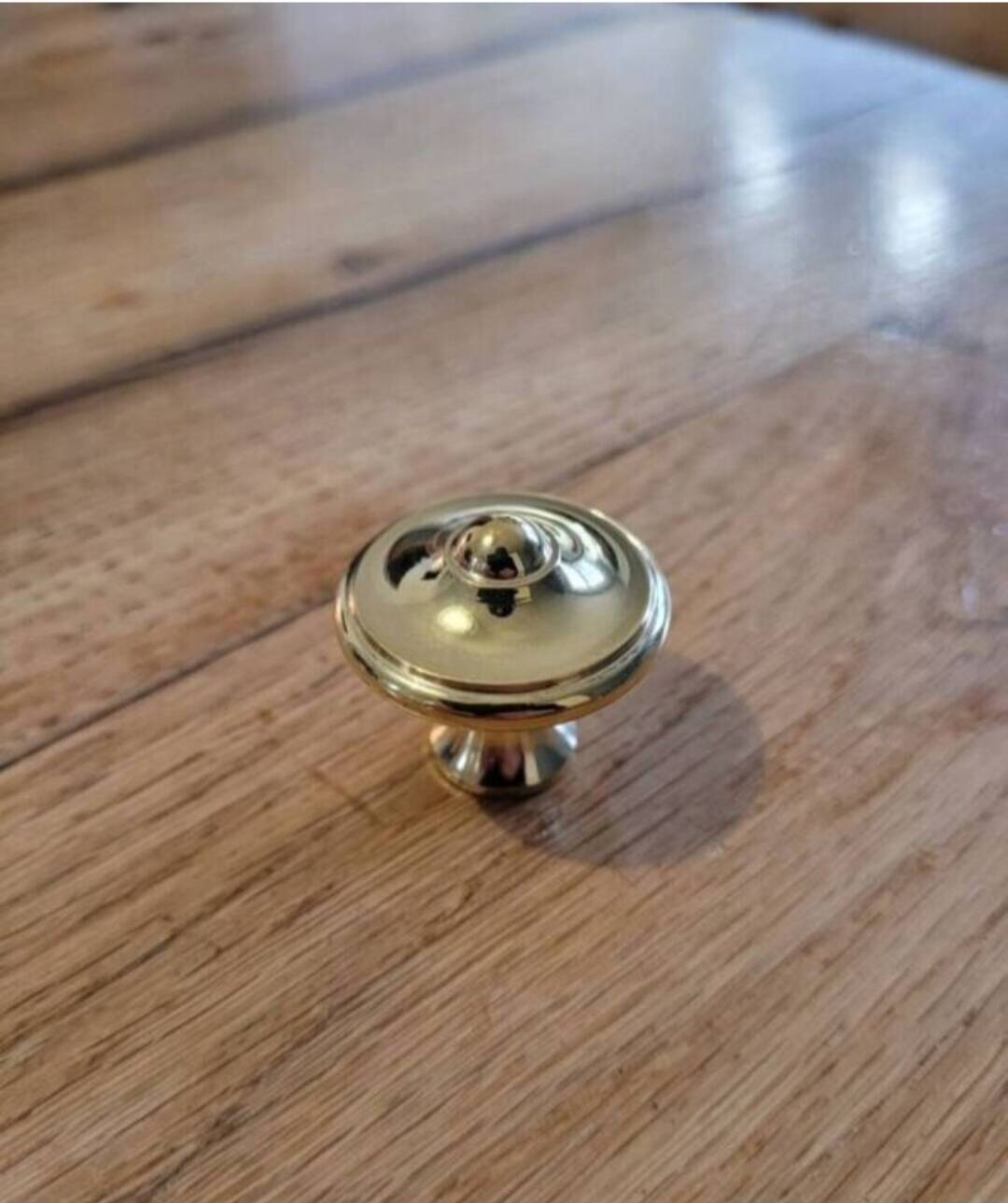 6 polished brass furniture knobs