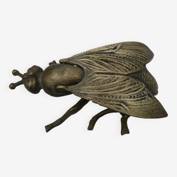 Old brass ashtray in the shape of a fly