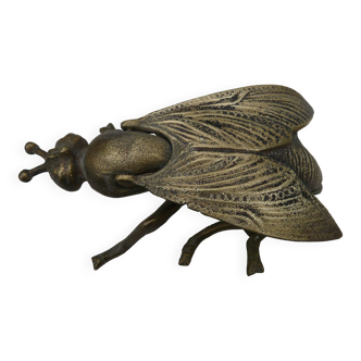 Old brass ashtray in the shape of a fly