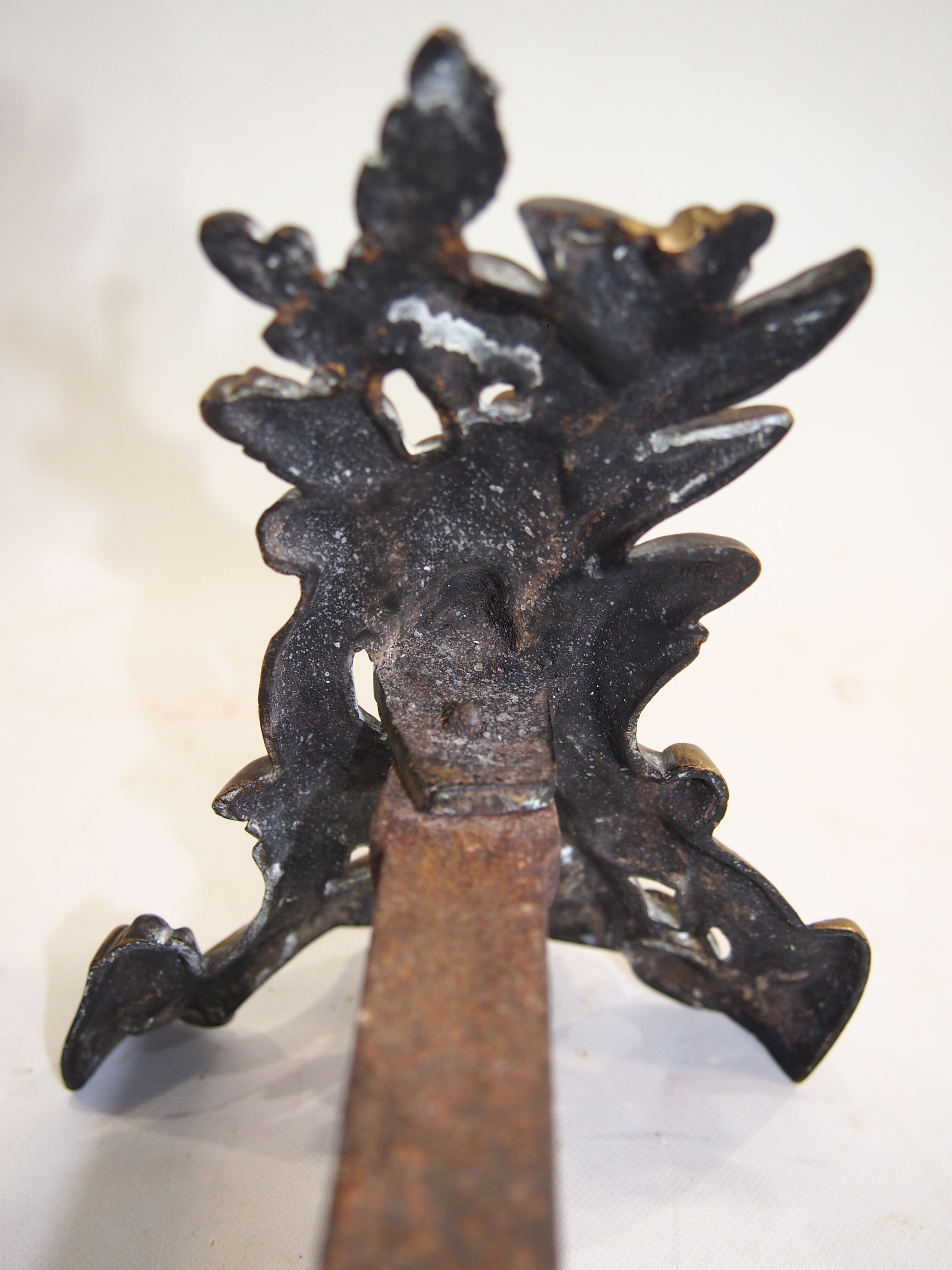 Pair of chimney tracks in bronze