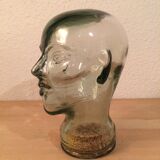 Molded glass head curiosity cabinet