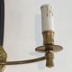 Pair of Black Lacquered Bronze Wall Lamps with Lions' Head Decorations. Around 1970
