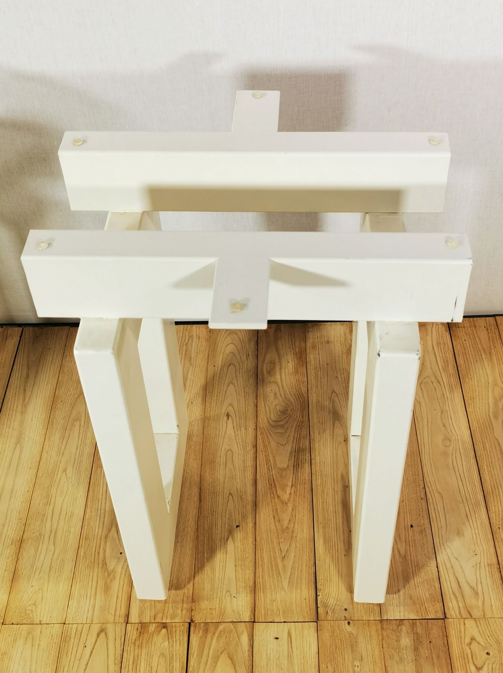 Pair of white painted metal harnesses, circa 1980