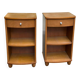 2 contemporary wooden bedside tables from the 2000s.
