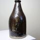 Bouteille en grès pyrité émaillé vintage artisanale signée Jean Lamy
