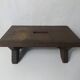 Old small wooden bench step in solid oak