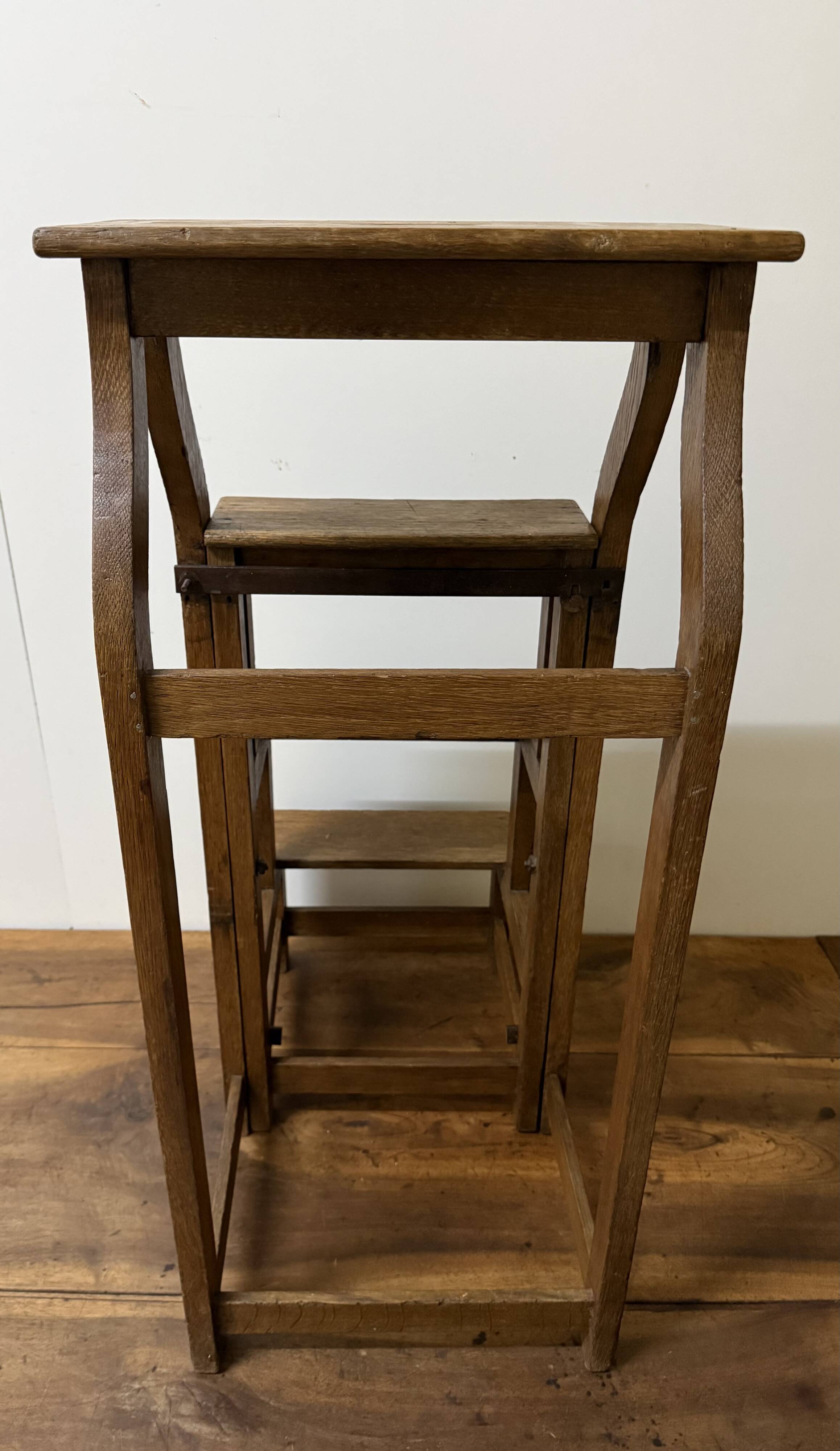 Stool transforming into a step ladder.